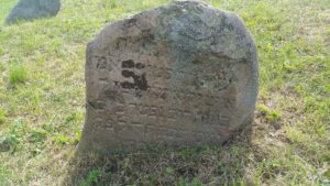 Boulder tombstones including obvious Hebrew inscriptions 