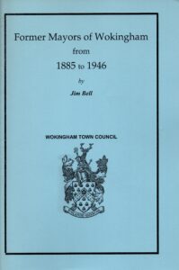 The light blue cover of a book titled "Former Mayors of Wokingham from 1885 to 1946" by Jim Bell, featuring the Wokingham Town Council coat of arms.