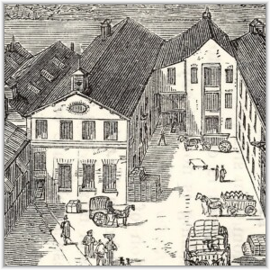 A historical engraving depicting a busy 19th-century warehouse courtyard filled with horse-drawn carts, stacked cargo crates, and people going about their work.